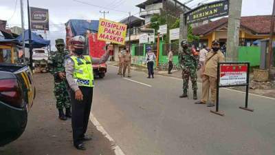 Foto : Jajaran Koramil 2214, Polsek Sedang Melakukan Operasi Yustisi 