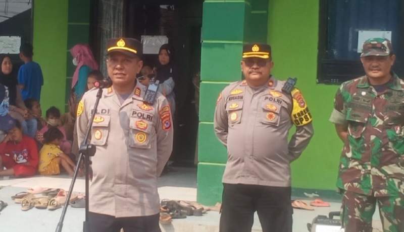 Aparat Gabungan Dampingi Pengukuran Tanah di Desa Munjul